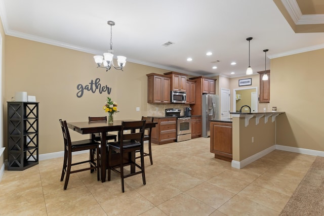 dining room with baseboards, visible vents, an inviting chandelier, recessed lighting, and ornamental molding