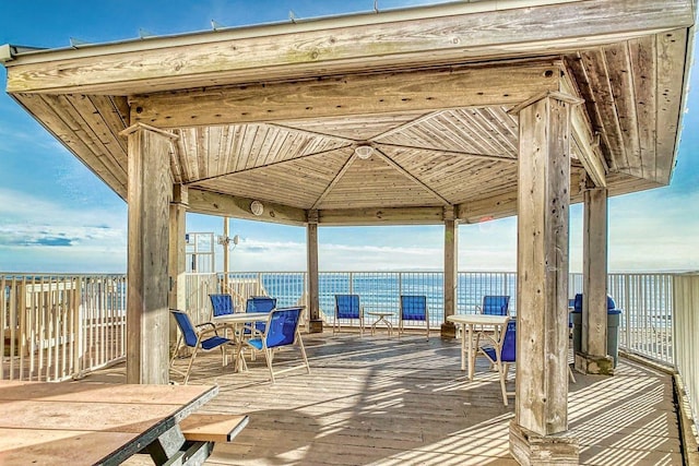 wooden terrace with a gazebo and grilling area