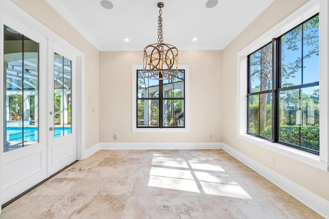 unfurnished dining area featuring recessed lighting, baseboards, a chandelier, and crown molding