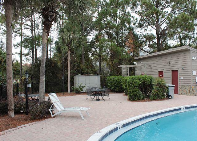 pool featuring a patio and fence