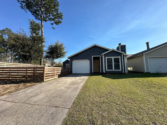 view of front of home with fence, concrete driveway, a front yard, a garage, and a chimney