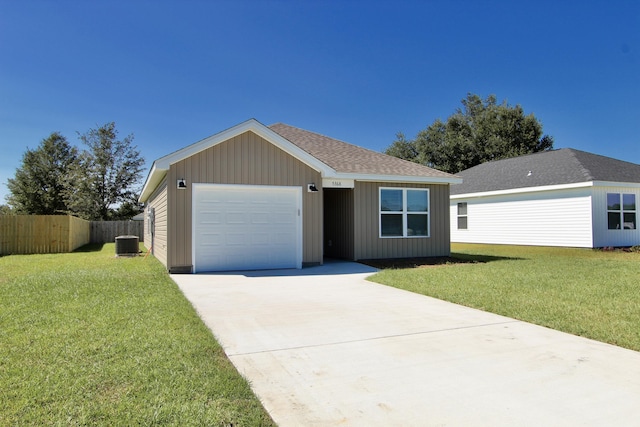 single story home featuring cooling unit, fence, roof with shingles, a front lawn, and concrete driveway