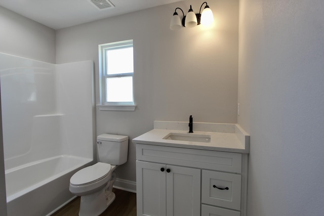 full bathroom featuring visible vents, toilet, wood finished floors, baseboards, and vanity