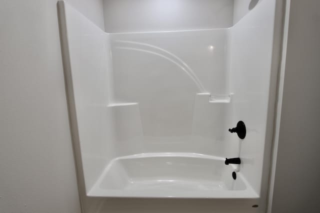 full bathroom featuring walk in shower