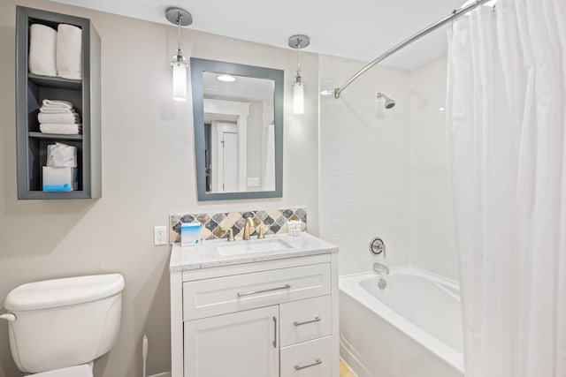 bathroom with decorative backsplash, toilet, vanity, and shower / tub combo with curtain