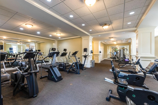 workout area featuring recessed lighting, ornate columns, and ornamental molding