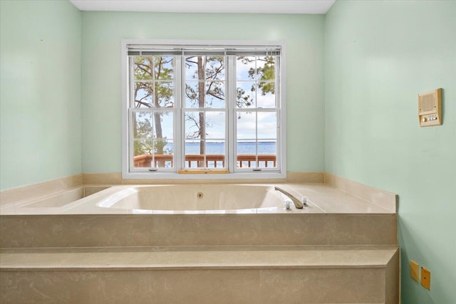 full bathroom with a garden tub