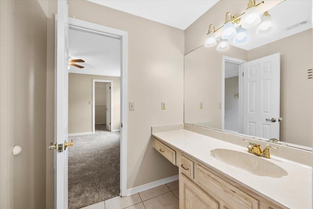 bathroom featuring visible vents, a ceiling fan, tile patterned flooring, baseboards, and vanity