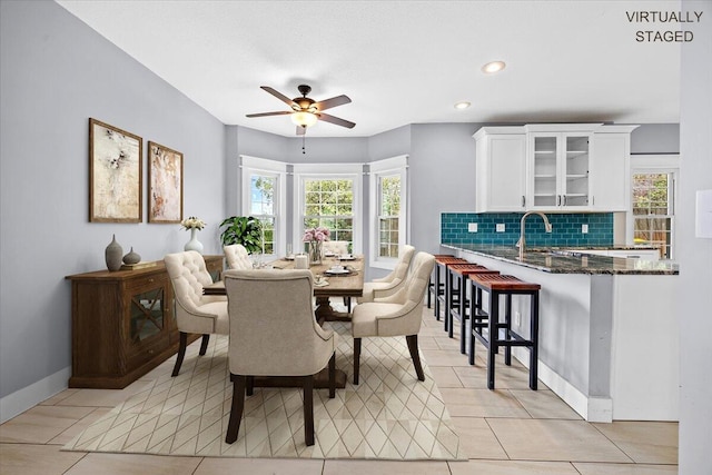 dining area with light tile patterned floors, recessed lighting, baseboards, and ceiling fan