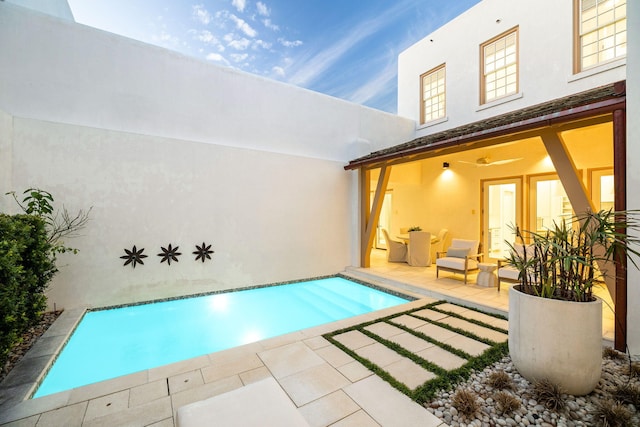 view of swimming pool featuring a patio