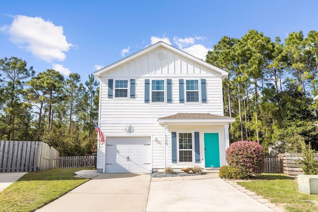 view of front of house featuring board and batten siding, concrete driveway, an attached garage, and fence