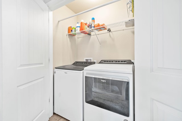 clothes washing area featuring laundry area and independent washer and dryer