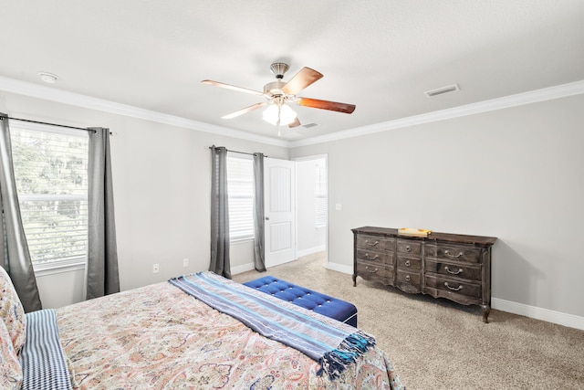 carpeted bedroom with multiple windows, baseboards, and visible vents