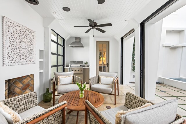 sunroom / solarium with visible vents, wooden ceiling, and ceiling fan