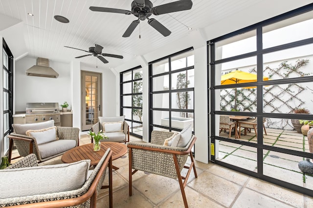 sunroom / solarium featuring wood ceiling