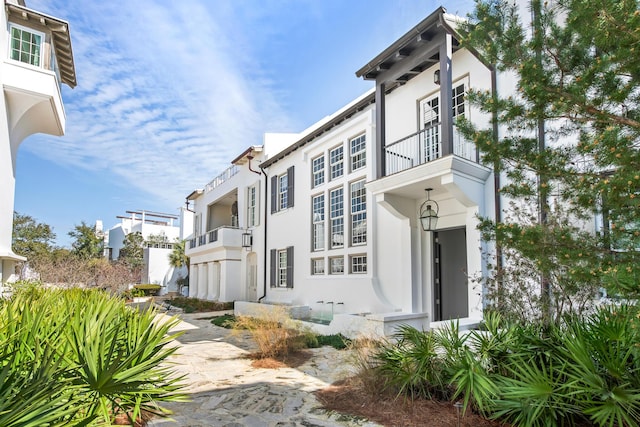 view of front of house featuring stucco siding