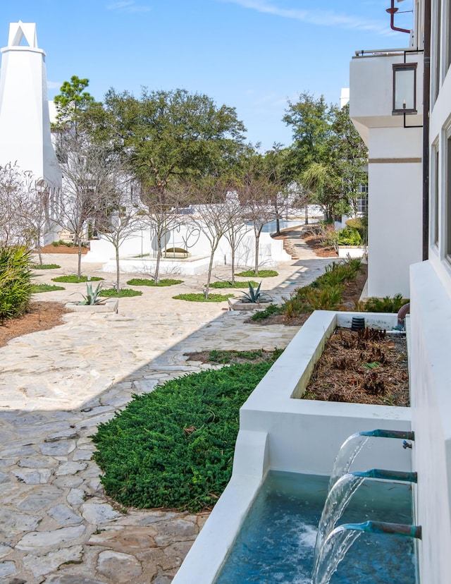 view of yard featuring a patio area and fence