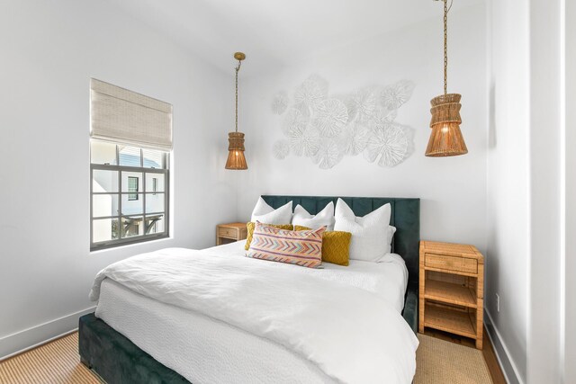 bedroom featuring baseboards