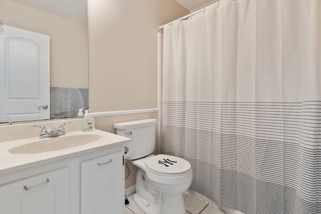 1634 N Campbell Dr, Fort Walton Beach, FL 32547 - full bath featuring vanity, a shower with shower curtain, tile patterned floors, and toilet
