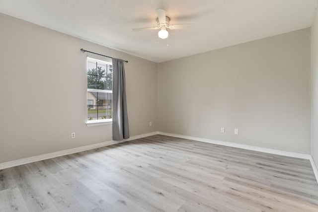 1634 N Campbell Dr, Fort Walton Beach, FL 32547 - spare room featuring a ceiling fan, baseboards, and light wood-style floors