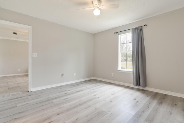 1634 N Campbell Dr, Fort Walton Beach, FL 32547 - unfurnished room with light wood-style floors, baseboards, and ceiling fan