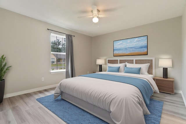 1634 N Campbell Dr, Fort Walton Beach, FL 32547 - bedroom featuring baseboards, a ceiling fan, and light wood-style flooring
