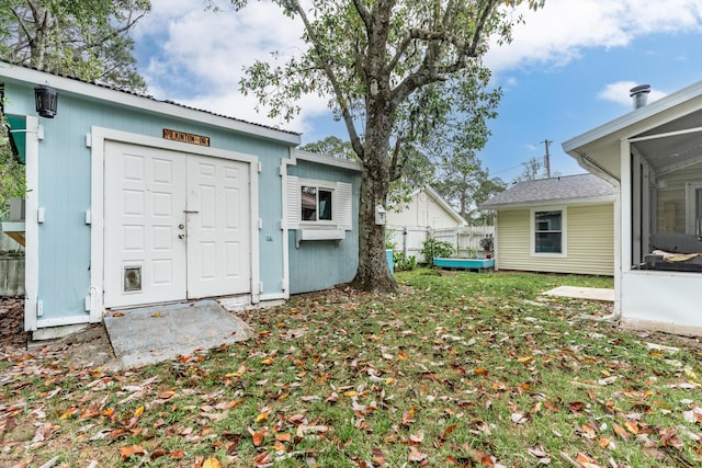 1634 N Campbell Dr, Fort Walton Beach, FL 32547 - view of outbuilding featuring an outdoor structure and fence
