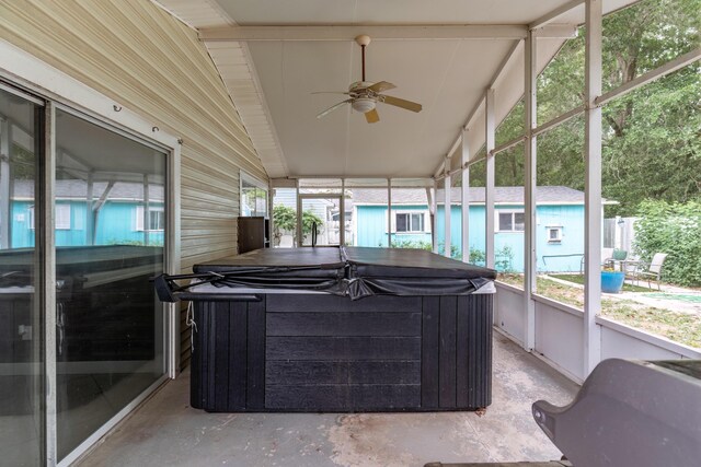 1634 N Campbell Dr, Fort Walton Beach, FL 32547 - sunroom featuring a hot tub and a ceiling fan