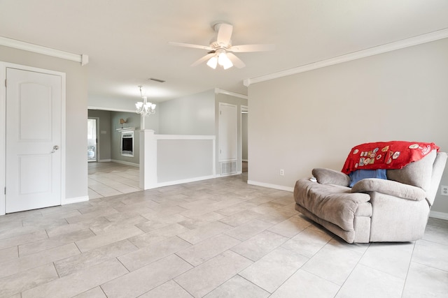 1634 N Campbell Dr, Fort Walton Beach, FL 32547 - living area featuring crown molding, visible vents, light tile patterned floors, and ceiling fan with notable chandelier