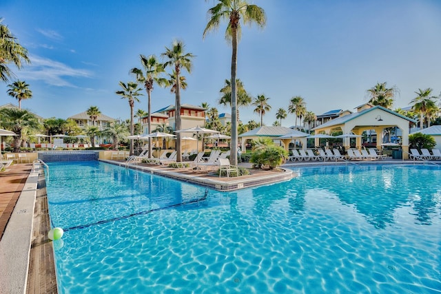 community pool with a patio area