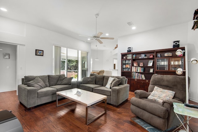 living area featuring visible vents, a ceiling fan, dark wood finished floors, recessed lighting, and baseboards