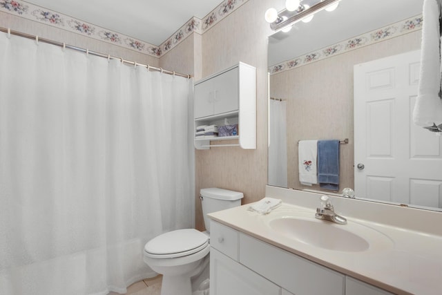 bathroom featuring tile patterned flooring, wallpapered walls, toilet, a shower with shower curtain, and vanity