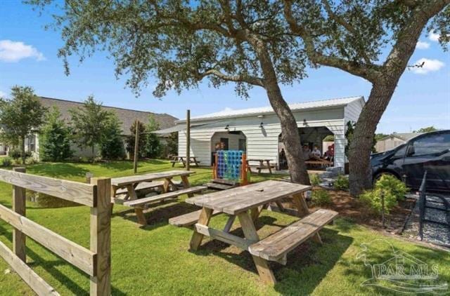1607 Woodlawn Way, Gulf Breeze, FL 32563 - view of property's community featuring a lawn