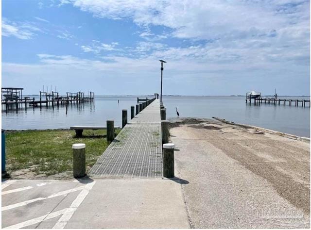 1607 Woodlawn Way, Gulf Breeze, FL 32563 - dock area with a boat ramp and a water view