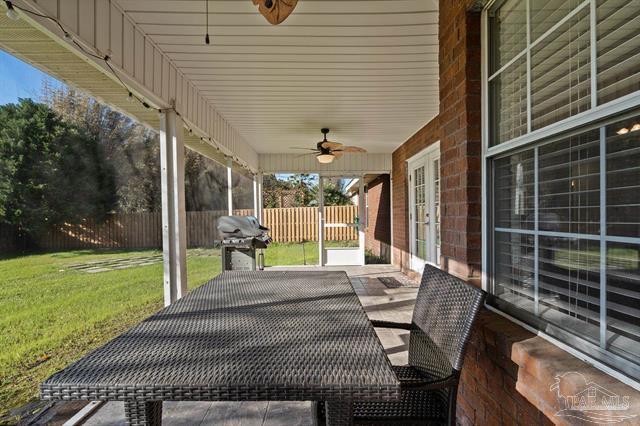 1607 Woodlawn Way, Gulf Breeze, FL 32563 - view of patio with area for grilling, a ceiling fan, and french doors