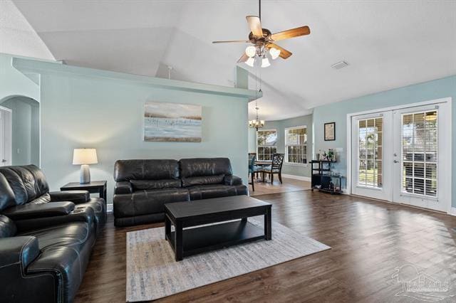 1607 Woodlawn Way, Gulf Breeze, FL 32563 - living room featuring lofted ceiling, ceiling fan, a chandelier, wood finished floors, and french doors