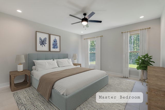 bedroom featuring recessed lighting, multiple windows, and baseboards