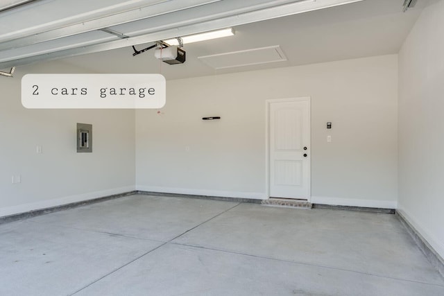 garage featuring electric panel, a garage door opener, and baseboards