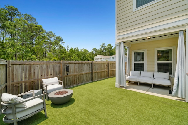 view of yard with an outdoor hangout area, a fenced backyard, and a patio