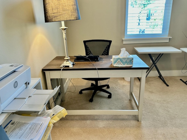 carpeted office with baseboards