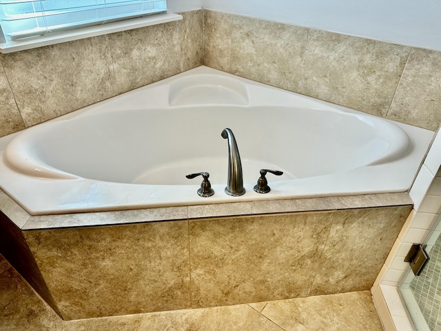 full bathroom featuring a garden tub