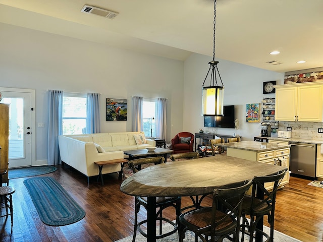 dining room featuring recessed lighting, wood finished floors, and visible vents