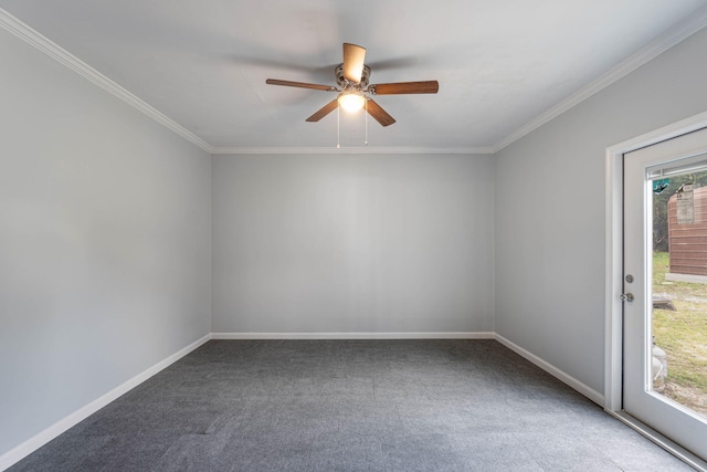 carpeted spare room with baseboards, a ceiling fan, and crown molding