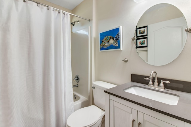 bathroom featuring vanity, shower / bath combination with curtain, and toilet