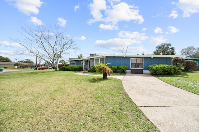 view of front of home with a front yard