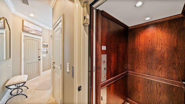 hall with crown molding, elevator, recessed lighting, and visible vents