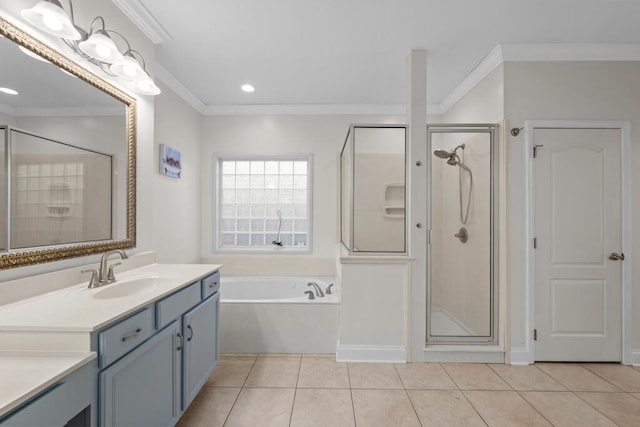 bathroom with tile patterned floors, a garden tub, crown molding, and a stall shower