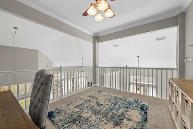 interior space featuring visible vents, carpet, ceiling fan, and crown molding