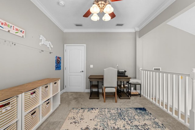 carpeted home office with ceiling fan, visible vents, and ornamental molding