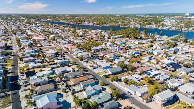 aerial view featuring a residential view and a water view